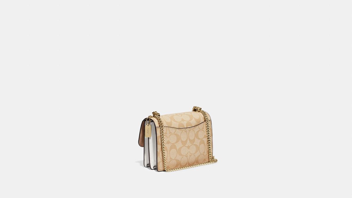 Сумка міні Klare Crossbody у фірмовому полотні